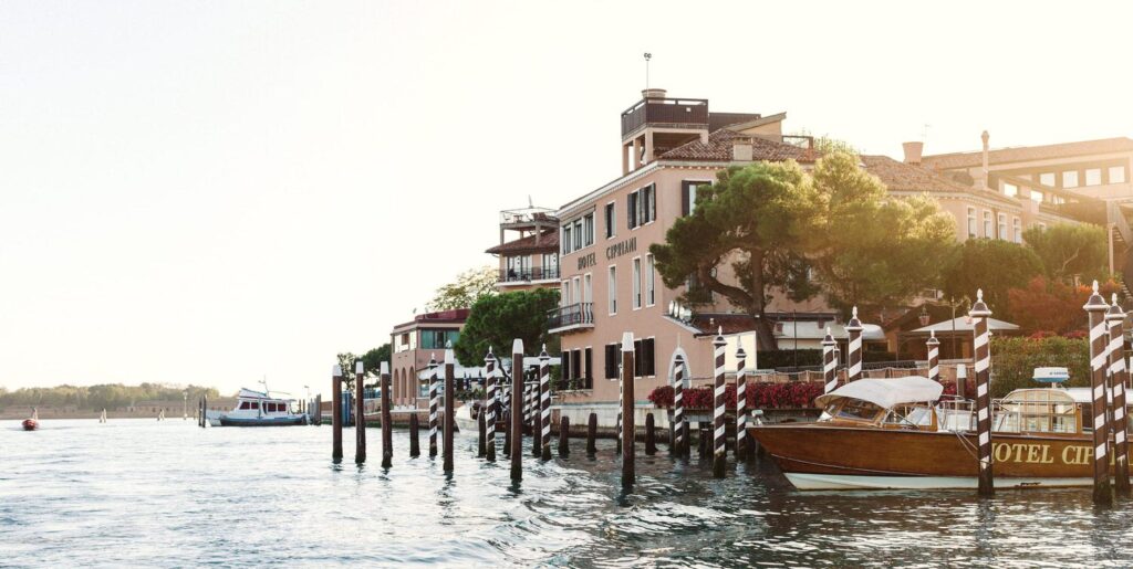 Belmond Hotel as viewed from water at sunset - Venice Wedding