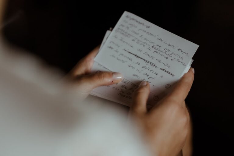 Bride writing her intimate wedding vows for his husband at Lake Como Wedding