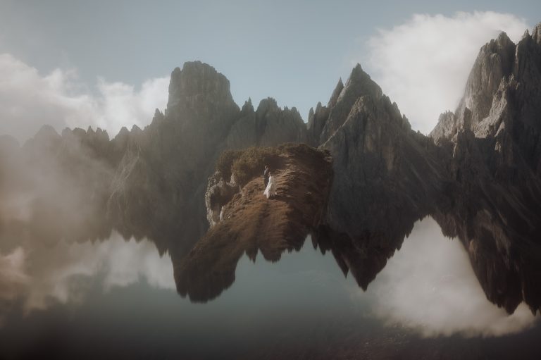 Couple walking at Cadini di Misurina during their Tre Cime Lavaredo Elopement