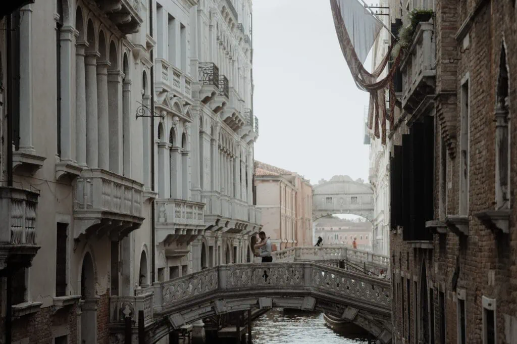 bride and groom on a bride during Venice elopement